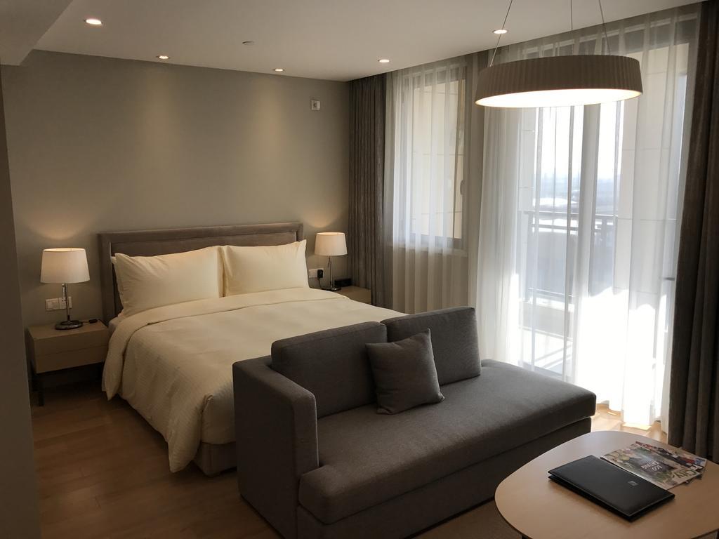 One Sunland Serviced Suites Managed By Lanson Place Xangai Quarto foto