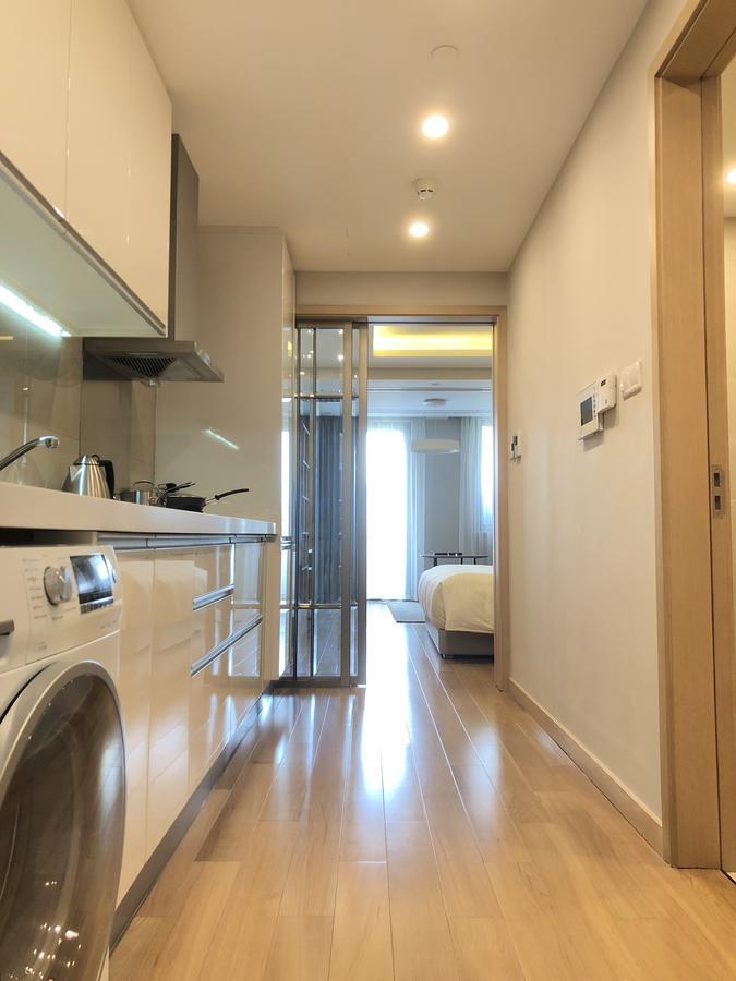 One Sunland Serviced Suites Managed By Lanson Place Xangai Quarto foto
